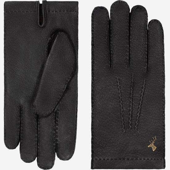 Pair of dark leather men’s gloves with stitched fingers and gold-tone logo at wrist