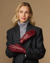 Bordeaux leather gloves for women with wool-cashmere lining, one hand folded