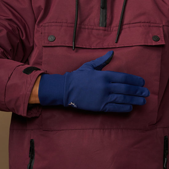 Blue activity glove with smooth back and fitted cuff