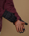 Men's quilted touchscreen gloves with brown palm panel and dark cuff