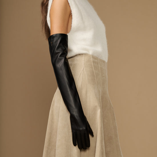 Black long leather glove with visible inner silk cuff lining