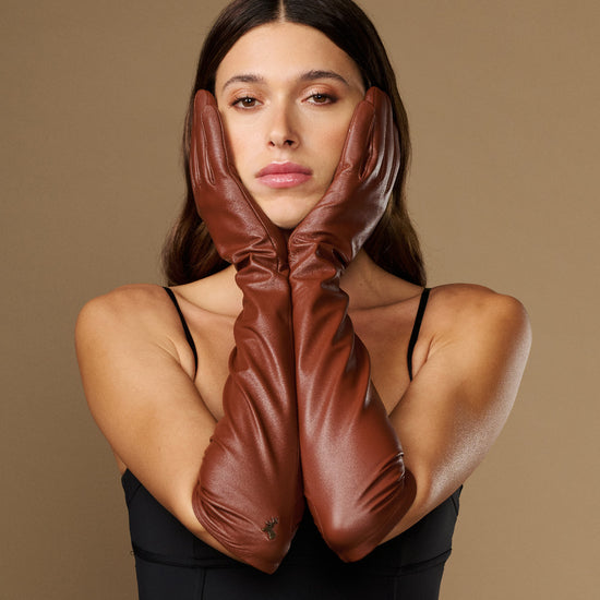 Women's elbow-length chocolate brown lambskin leather gloves with smooth cuff