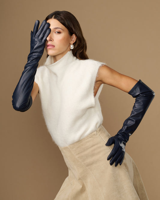 Navy lambskin leather opera gloves with long cuffs and silk lining, worn with gloves raised