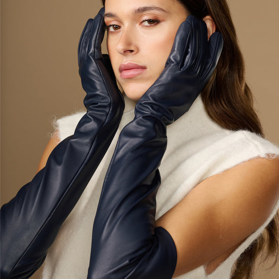 Navy leather opera gloves with long cuffs and silk lining, gloves covering the ears