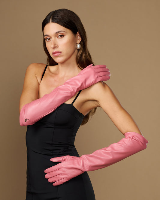 Pink lambskin elbow-length gloves with silk lining and touchscreen-ready cuffs
