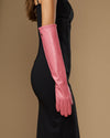 Pink lambskin elbow gloves with long fitted cuffs and smooth leather finish